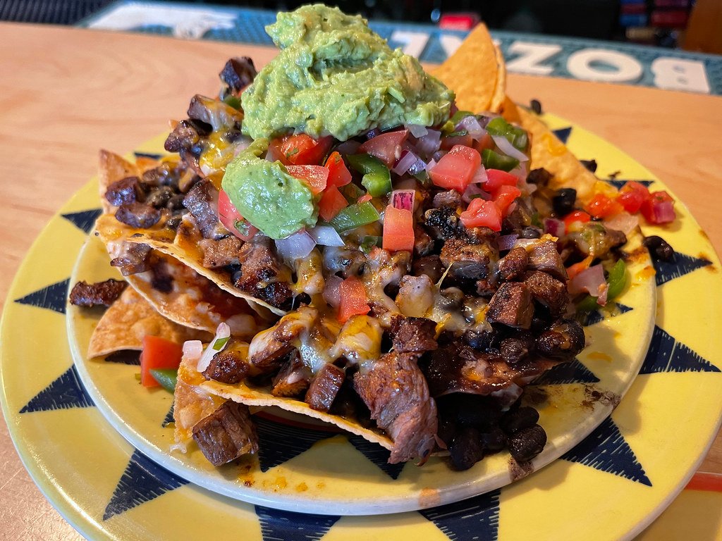 Loaded Nachos - Hit it with fresh, cold toppings immediately