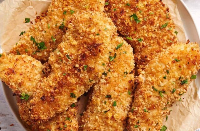 Crispy Oven Baked Chicken Tenders On A Baking Sheet 3279